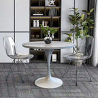 Table à manger ronde avec plateau en résine blanche et pied central en acier blanc