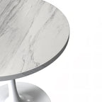 Table à manger ronde avec plateau en résine blanche et pied central en acier blanc